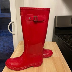 Seven Red Rainboots